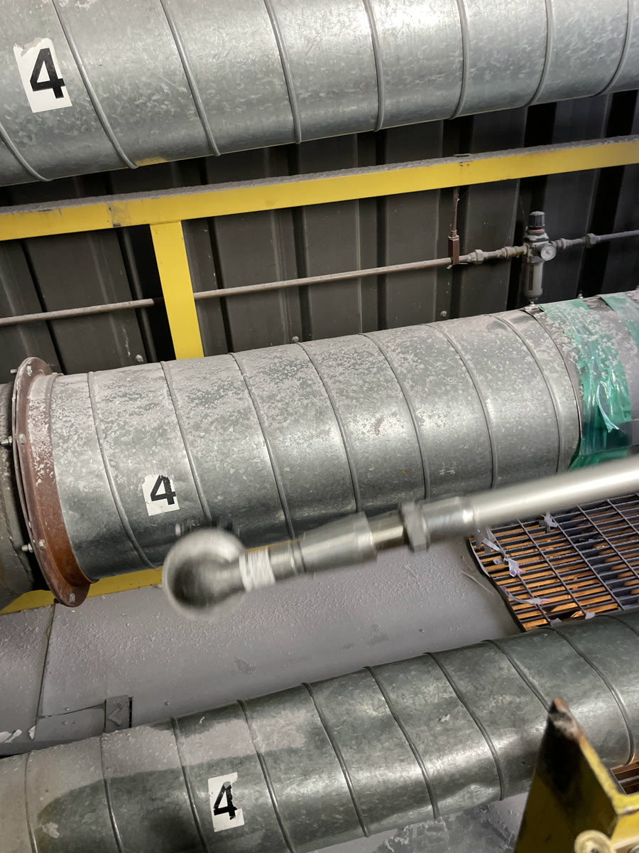 Nettoyage de conduits par aspiration, usine d'emballage